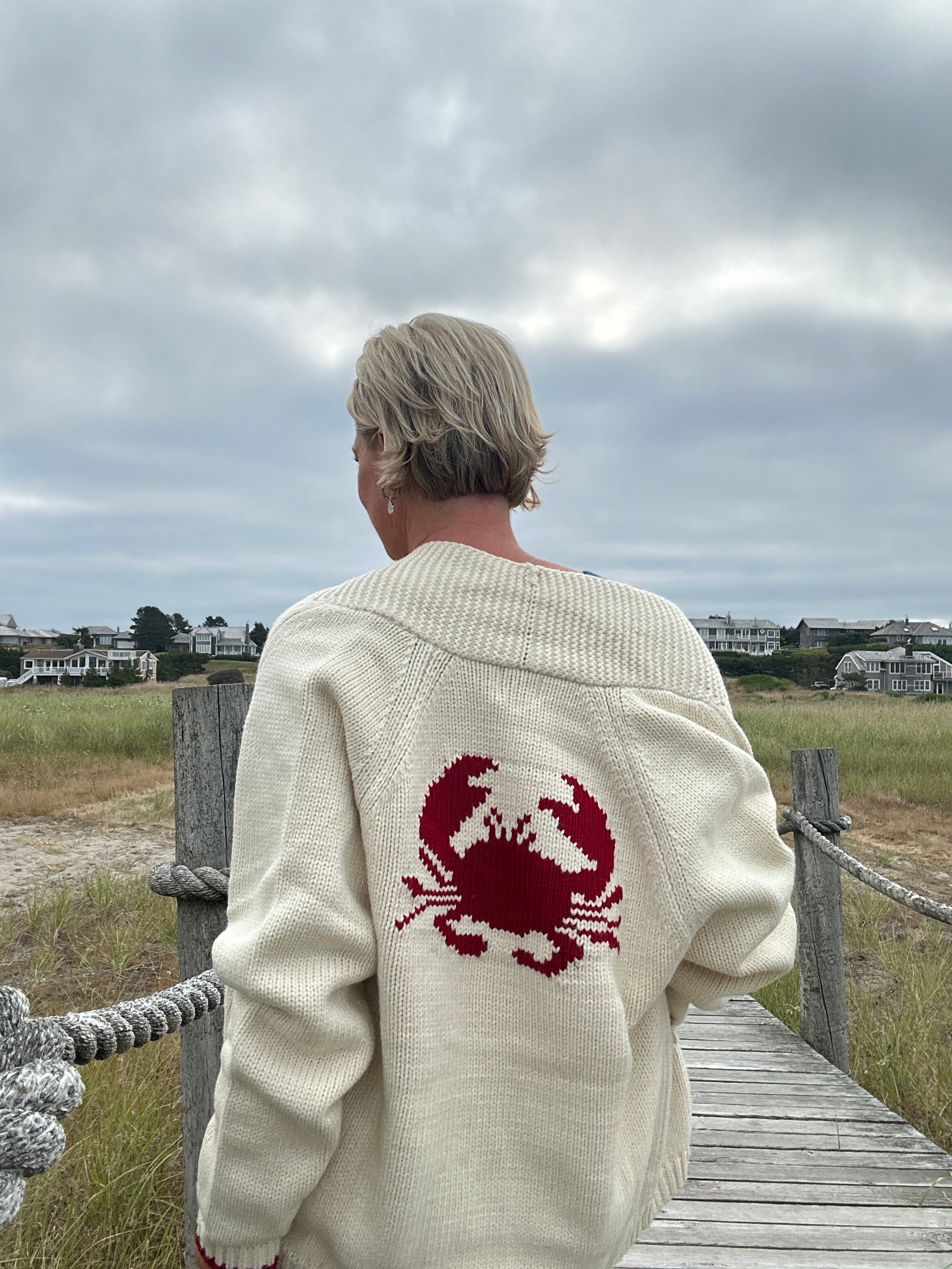 Cozy Crab Cardigan cream back