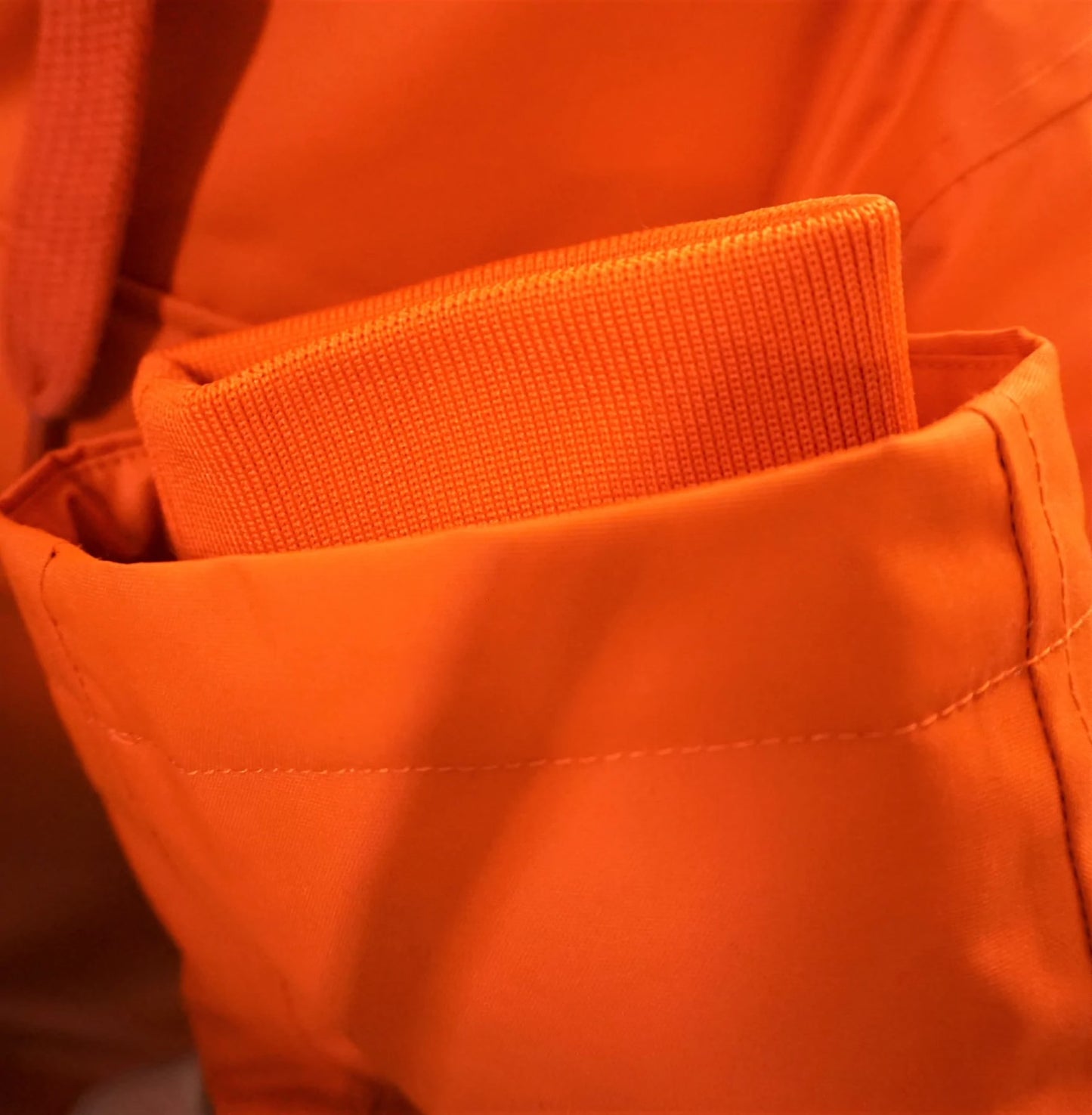 Wanakome Men's Icarus Parka | Orange sleeve