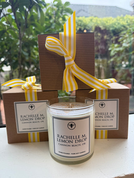 Custom Rachelle M “Lemon Drop” candle with cardboard packaging and ribbon