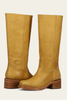 A pair of banana yellow, leather Frye Campus 14L boots with a round toe and chunky heel.