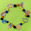 Do It Yourself Wood Garland outer space colored in