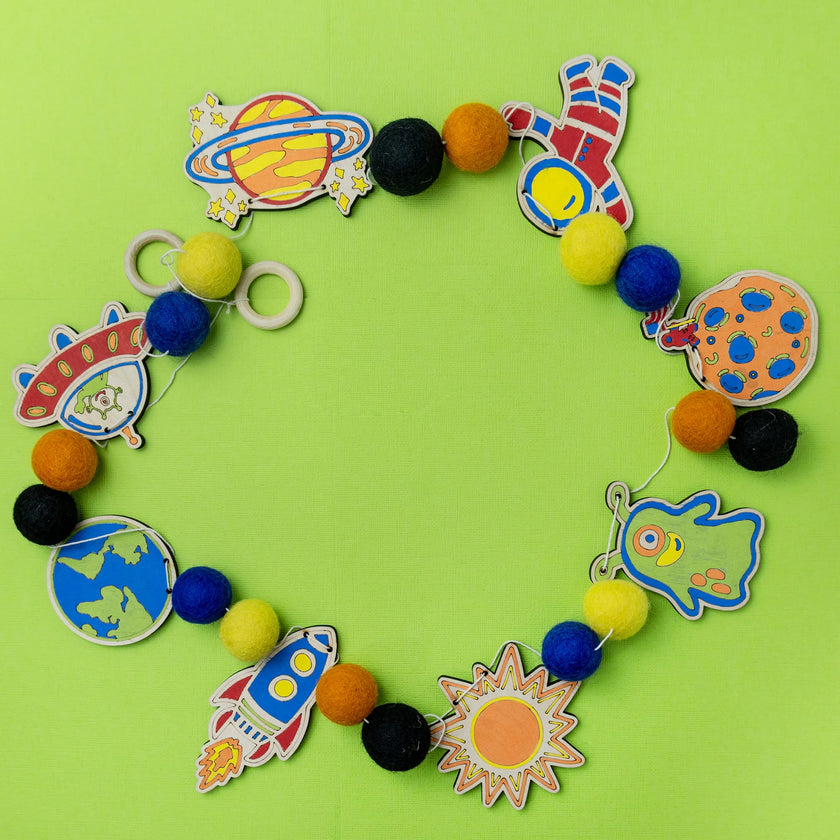 Do It Yourself Wood Garland outer space colored in