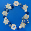 Do It Yourself Wood Garland snowflake colored in