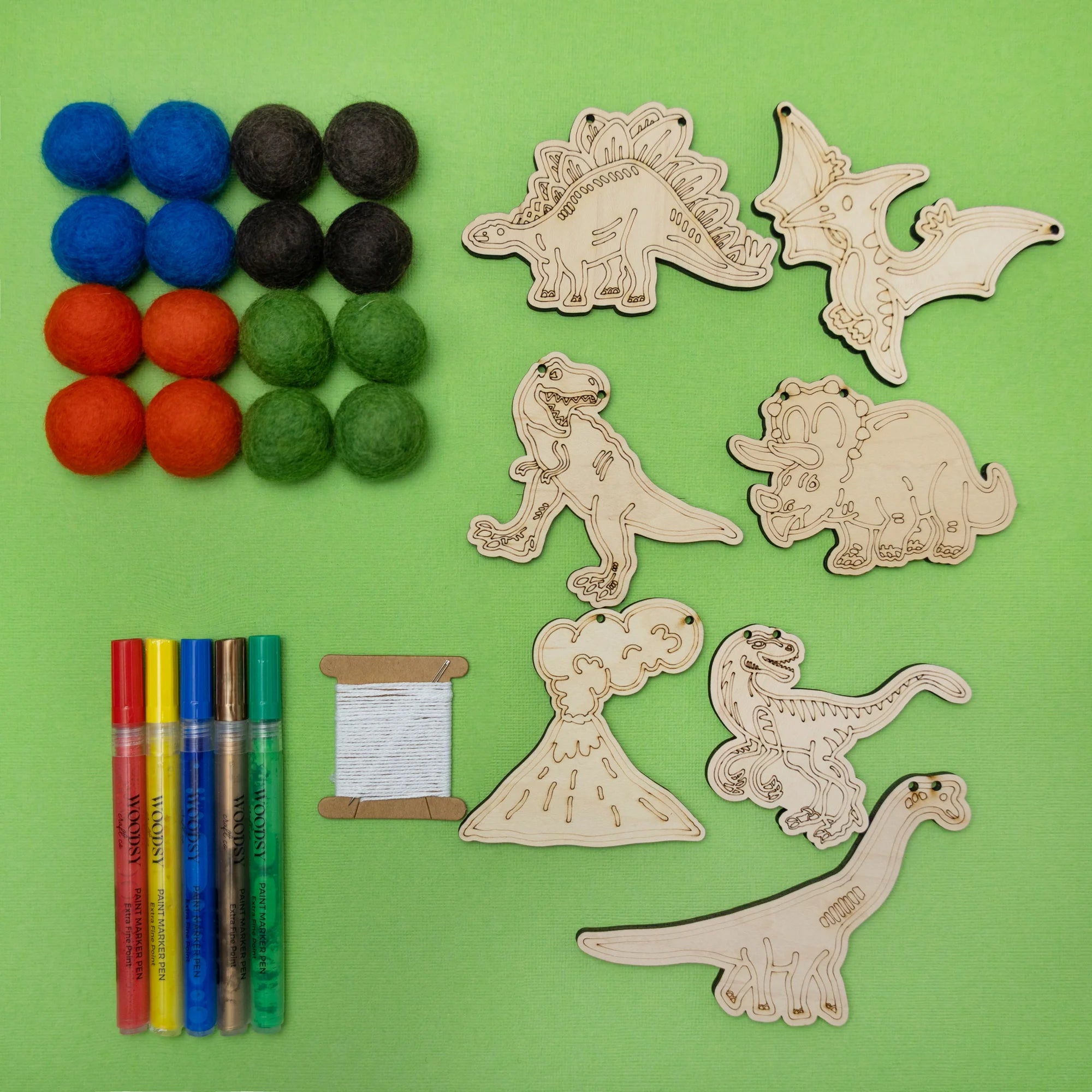 Do It Yourself Wood Garland dinosaurs as it comes