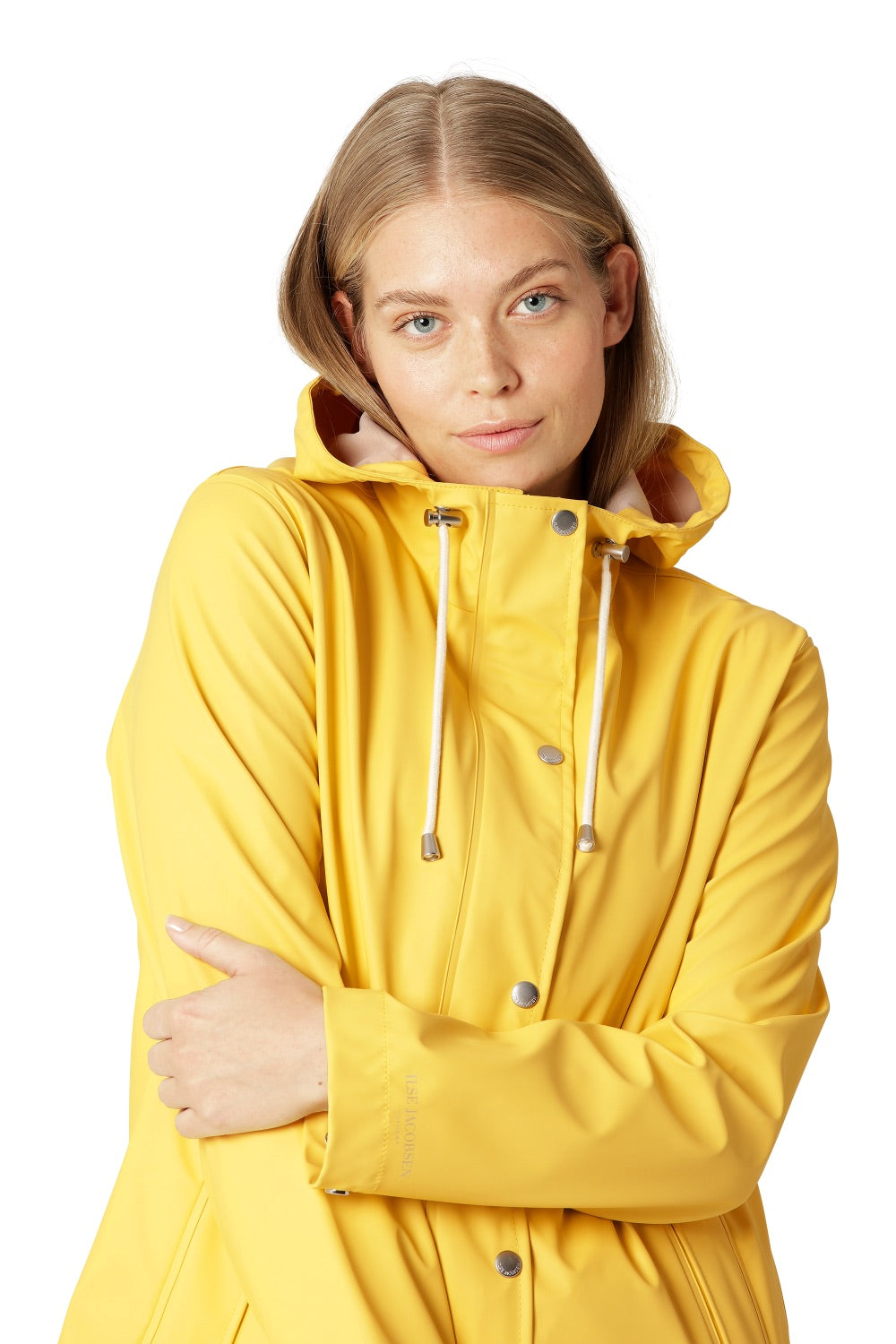Close up view of the front of a yellow Ilse Jacobsen 228FR Raincoat