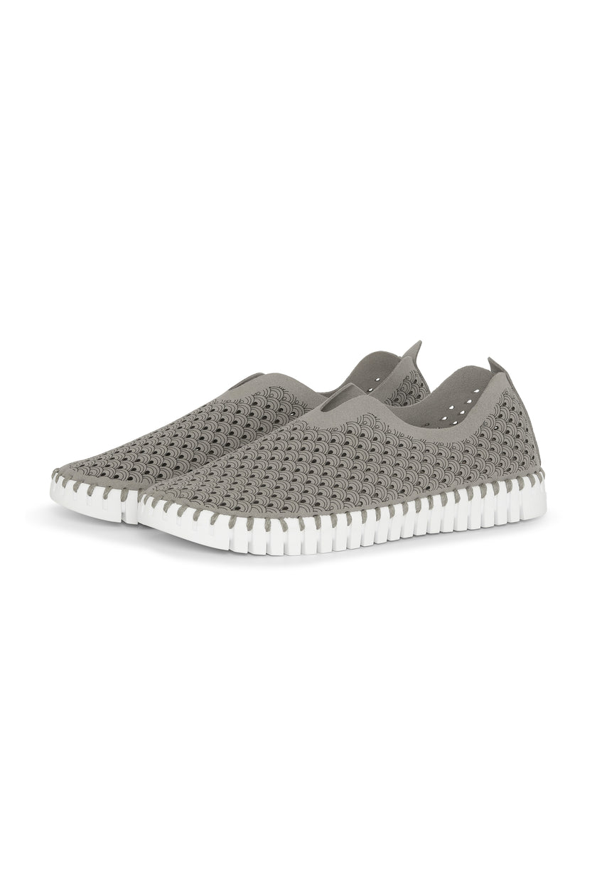 A pair of Grey Ilse Jacobsen Tulip 139 shoes with a laser cut pattern on the upper and a white sole