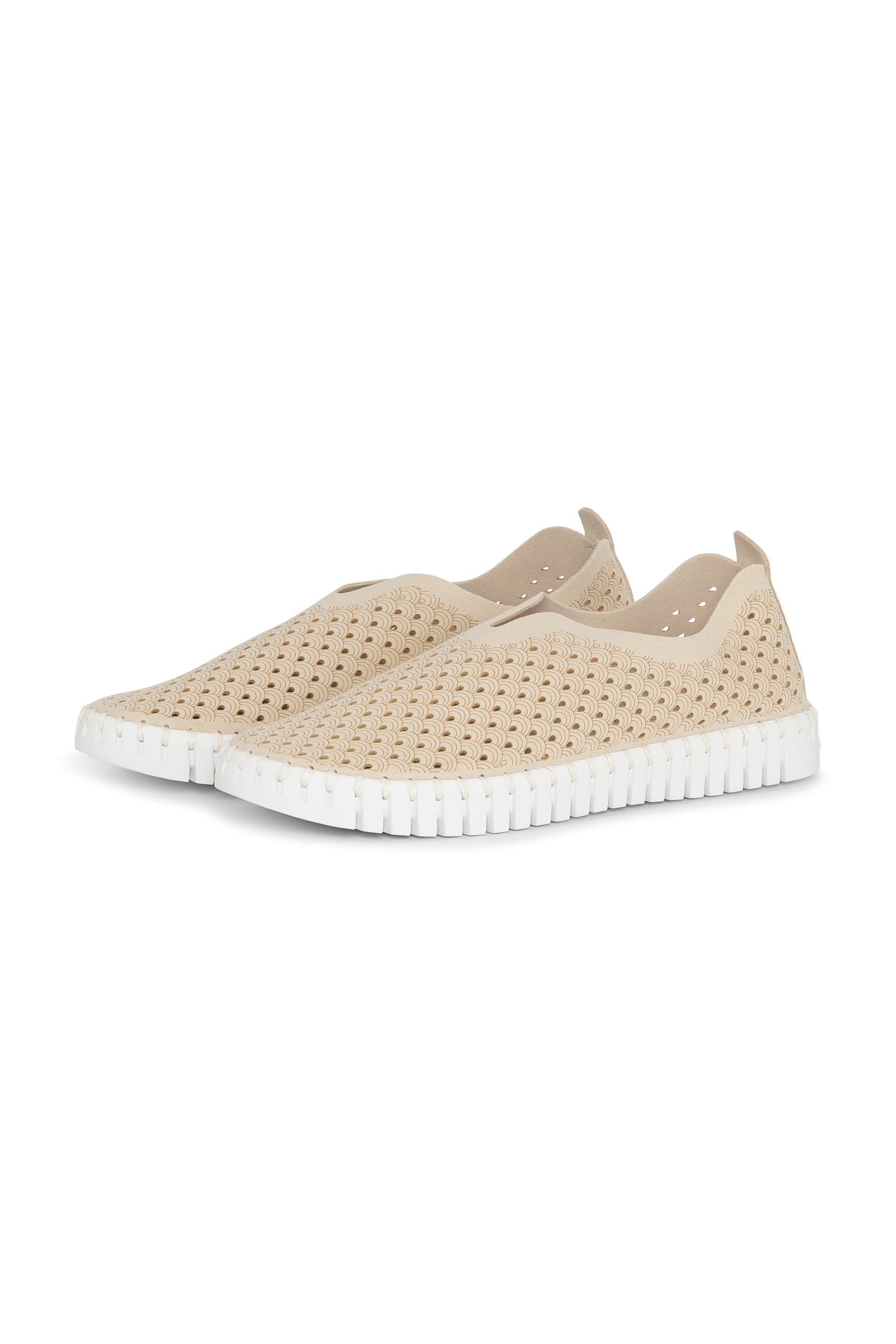 A pair of Kit Ilse Jacobsen Tulip 139 shoes with a laser cut pattern on the upper and a white sole