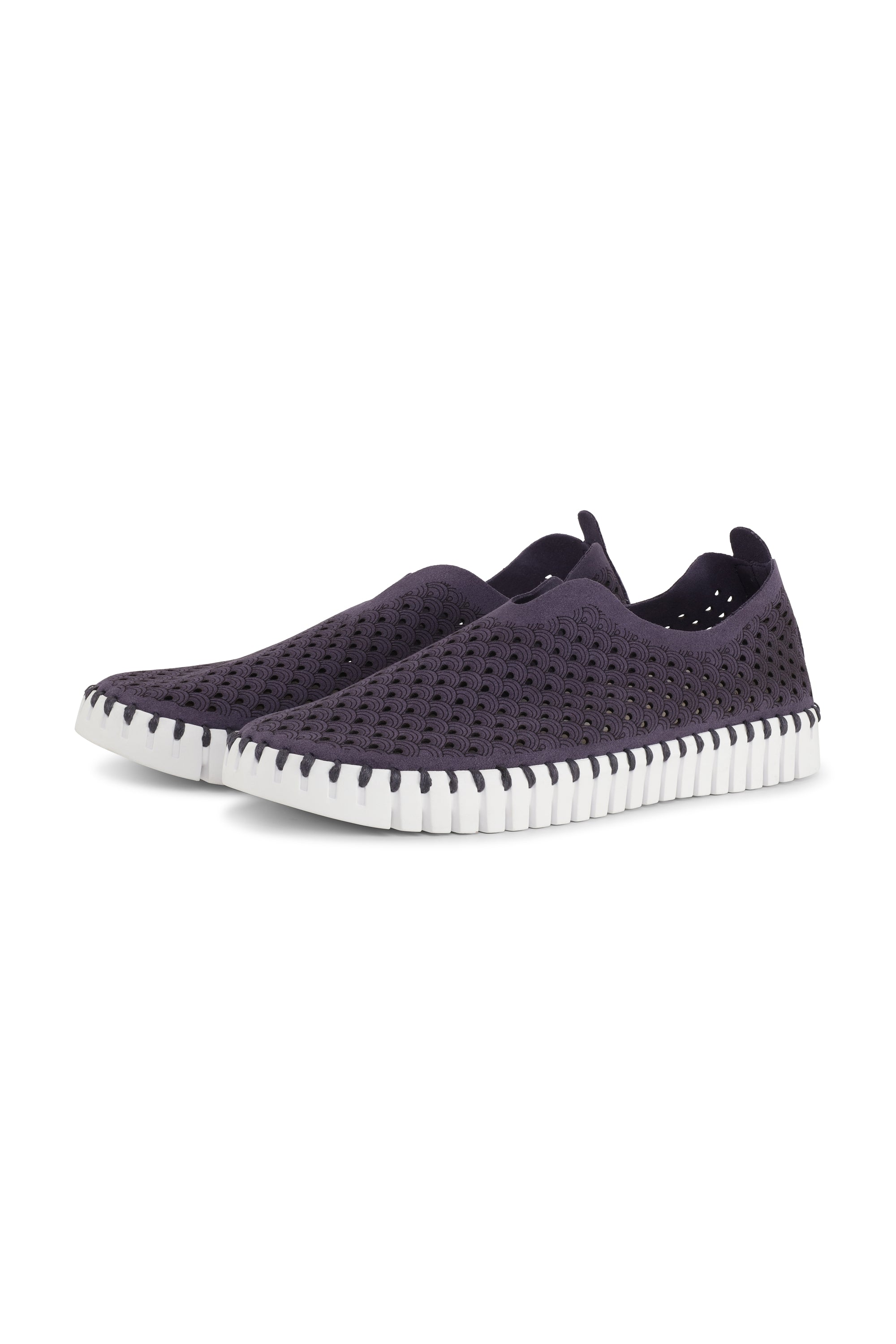 A pair of Navy Ilse Jacobsen Tulip 139 shoes with a laser cut pattern on the upper and a white sole