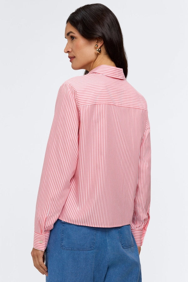Woman wearing a pink striped shirt.