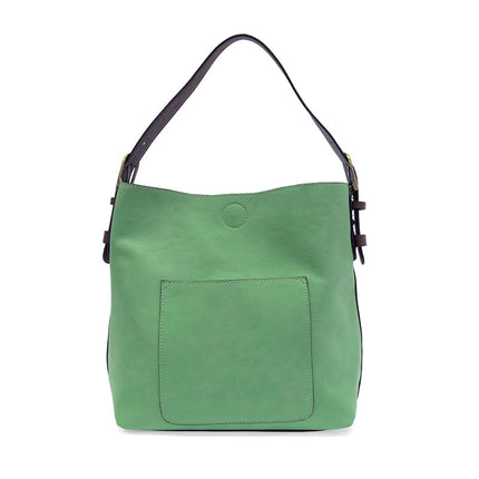 Mint Green handbag with a black strap on a white background