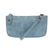 A blue jay-colored mini crossbody wristlet clutch with brass plated hardware and a printed lining, displayed with the wristlet strap visible