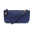 A dark cobalt-colored mini crossbody wristlet clutch with brass plated hardware and a printed lining, displayed with the wristlet strap visible