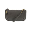 A dark grey-colored mini crossbody wristlet clutch with brass plated hardware and a printed lining, displayed with the wristlet strap visible