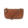 A dark maple-colored mini crossbody wristlet clutch with brass plated hardware and a printed lining, displayed with the wristlet strap visible