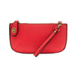 An extreme rose-colored mini crossbody wristlet clutch with brass plated hardware and a printed lining, displayed with the wristlet strap visible