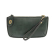 A green opal-colored mini crossbody wristlet clutch with brass plated hardware and a printed lining, displayed with the wristlet strap visible