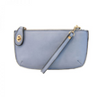 A hyrdrangea-colored mini crossbody wristlet clutch with brass plated hardware and a printed lining, displayed with the wristlet strap visible