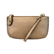 A metallic light bronze-colored mini crossbody wristlet clutch with brass plated hardware and a printed lining, displayed with the wristlet strap visible