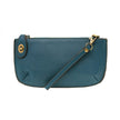 A peacock-colored mini crossbody wristlet clutch with brass plated hardware and a printed lining, displayed with the wristlet strap visible