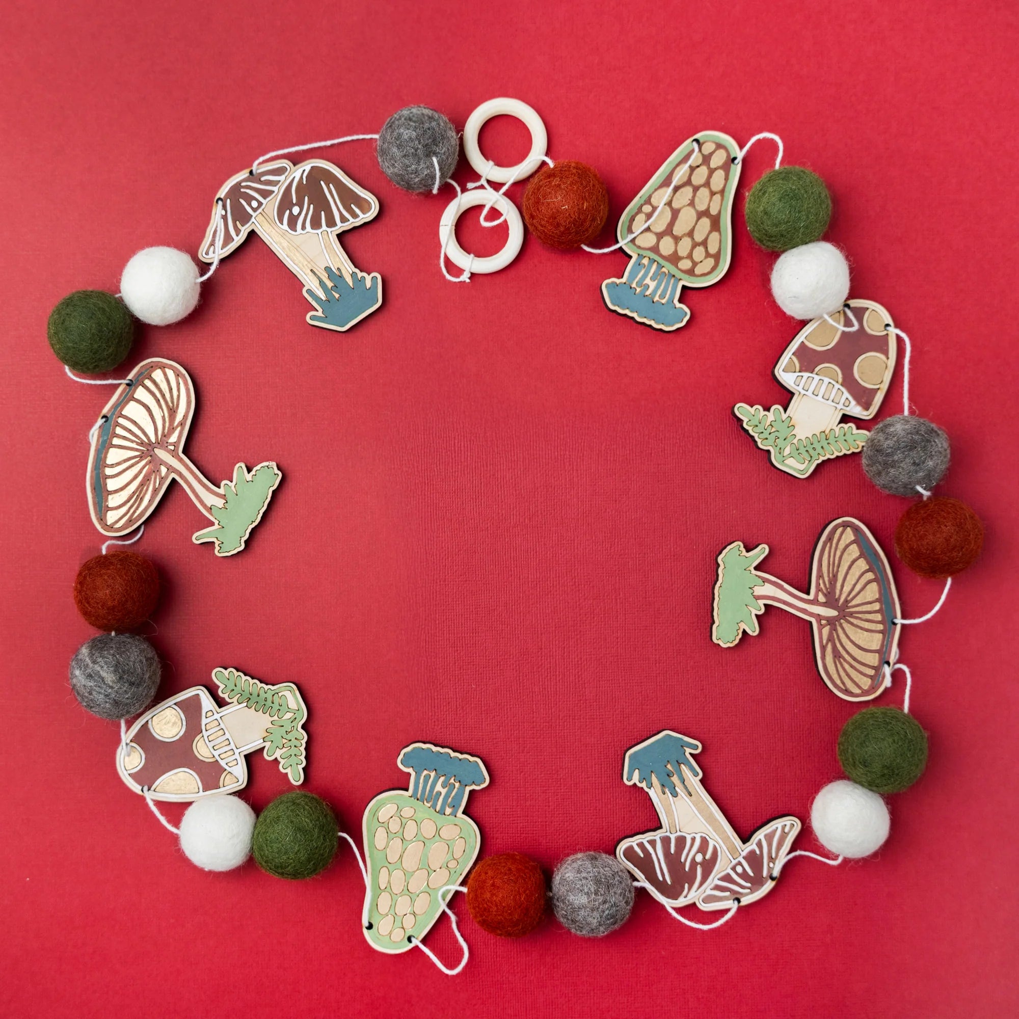 Do It Yourself Wood Garland mushroom colored in