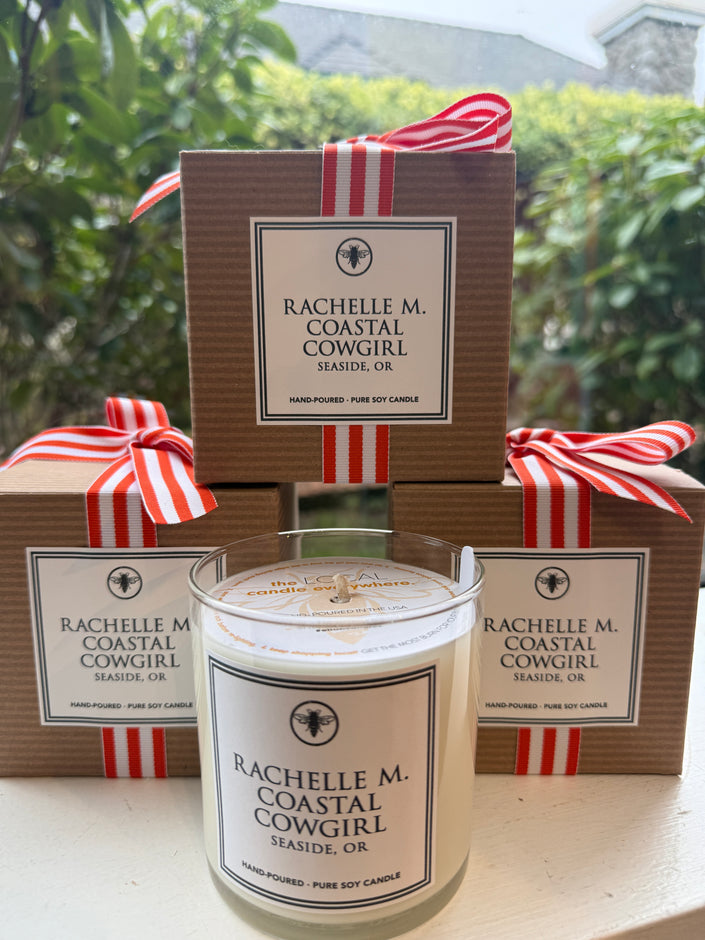 Rachelle M Coastal Candle with cardboard packaging and ribbon