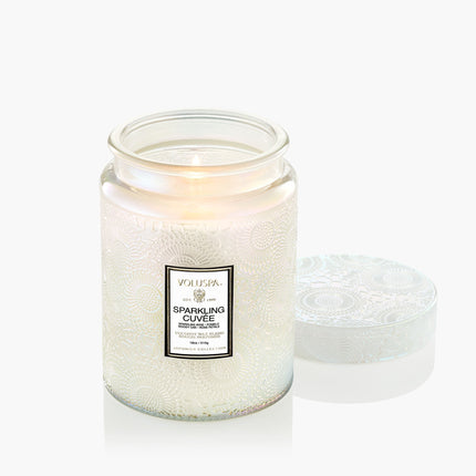 Sparkling Cove candle by Voluspa on a white background