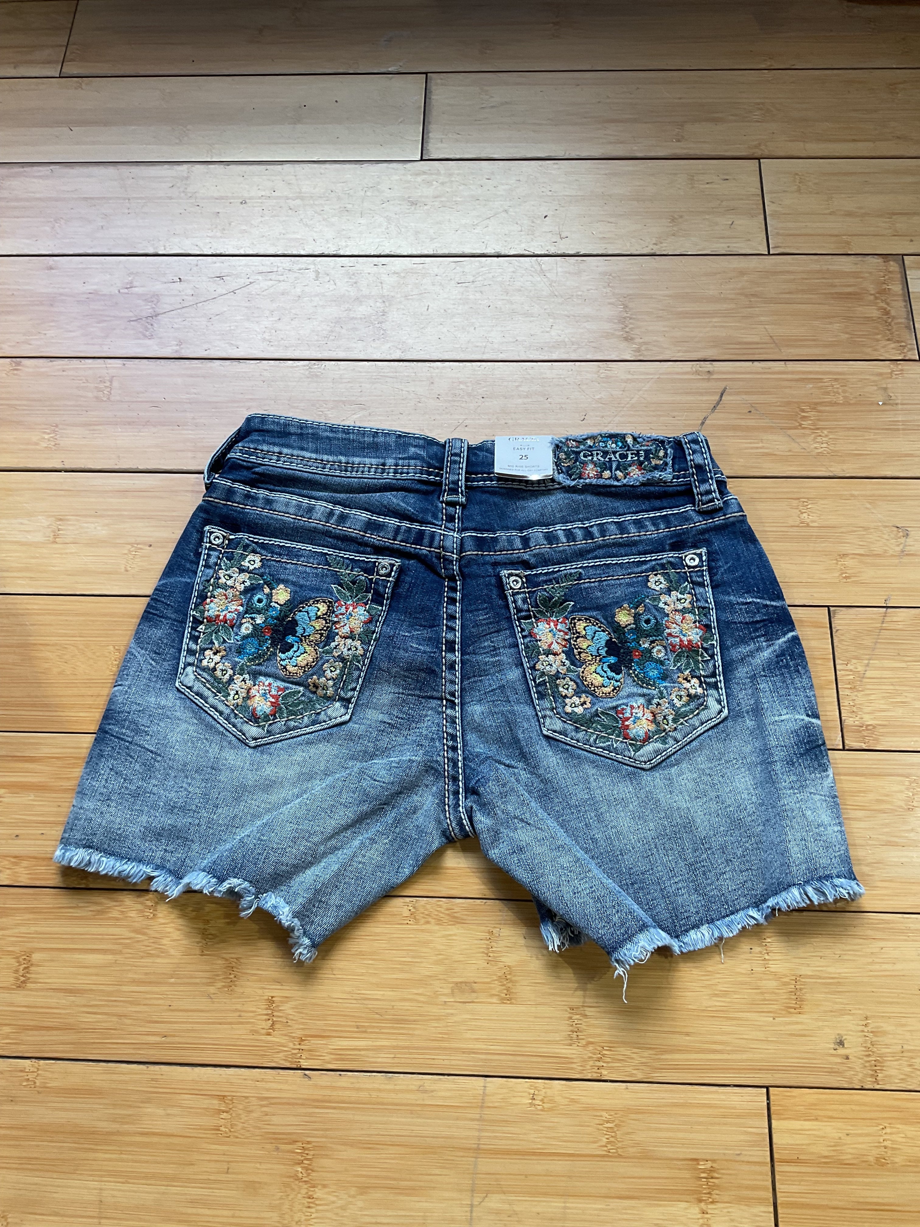 Grace denim butterfly/floral embroidered frayed hem short-back