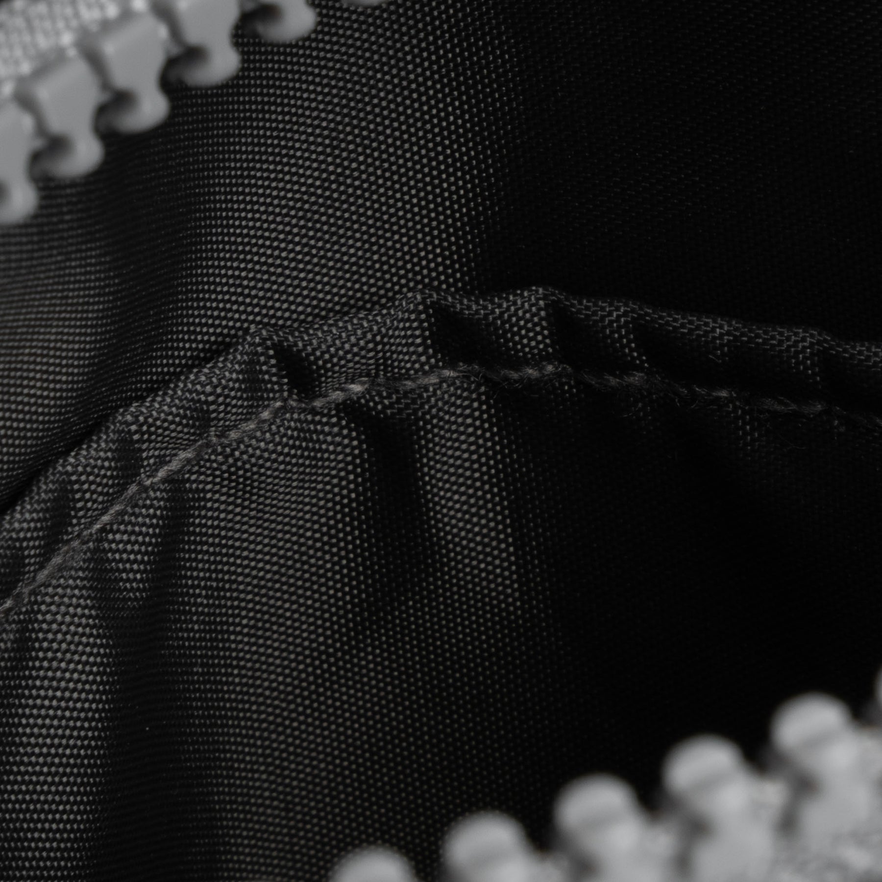 Chelsea (Recycled Nylon) Pocket Sling Extra Small | stiching