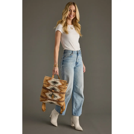 Tan, Camel & Teal Aztec Backpack carried