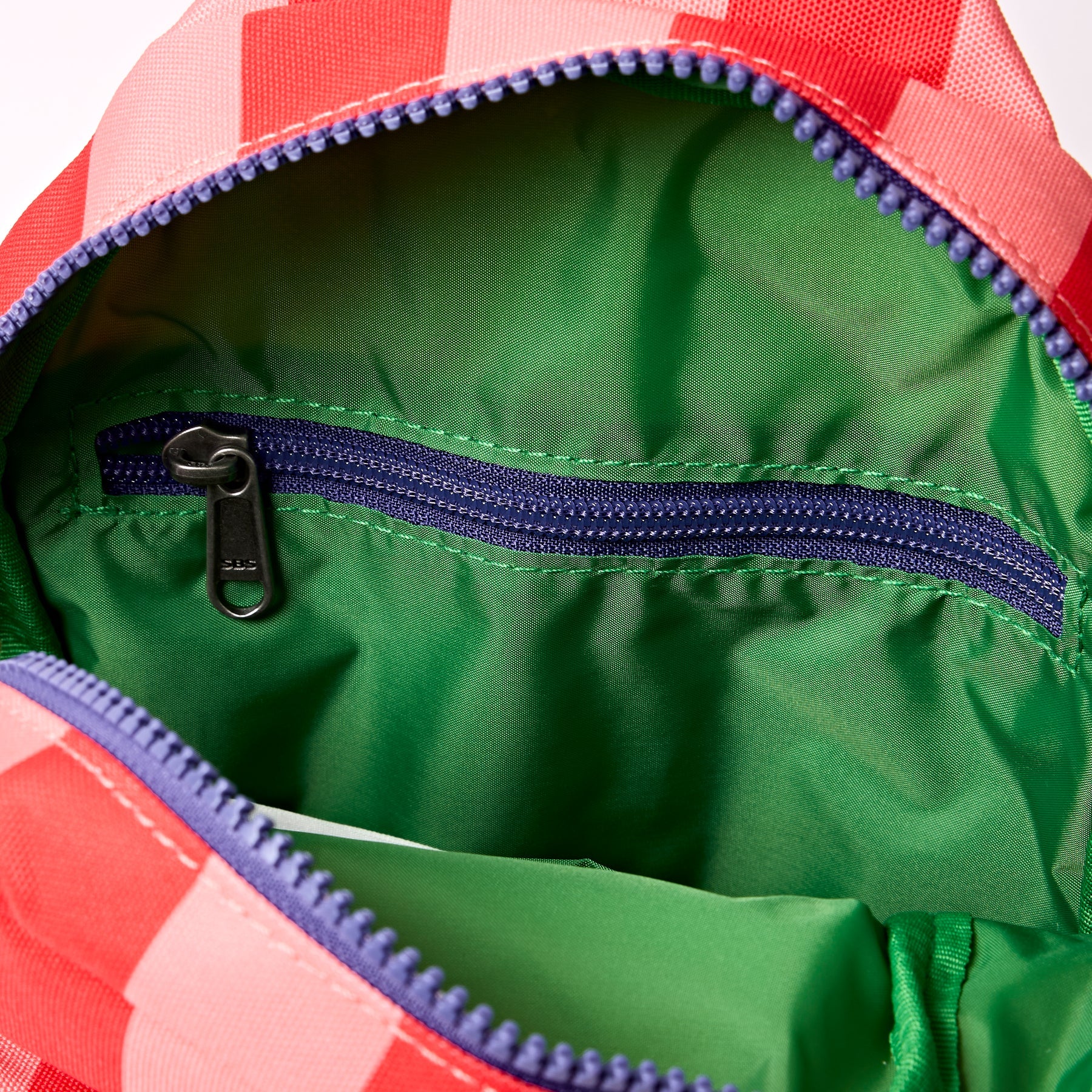 Willesden B Large Sustainable Scooter Bag | Circus Print, red pink stripe-green interior detail
