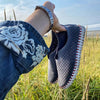 A pair of the Rachelle M Exclusive colorway Beachwalker Ilse Jacobsen Tulip139 shoes with a laser cut pattern on the upper and a white sole.