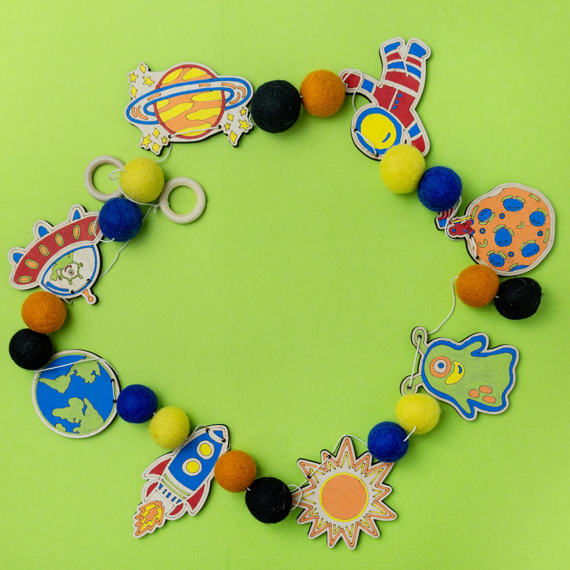Do It Yourself Wood Garland outer space colored in