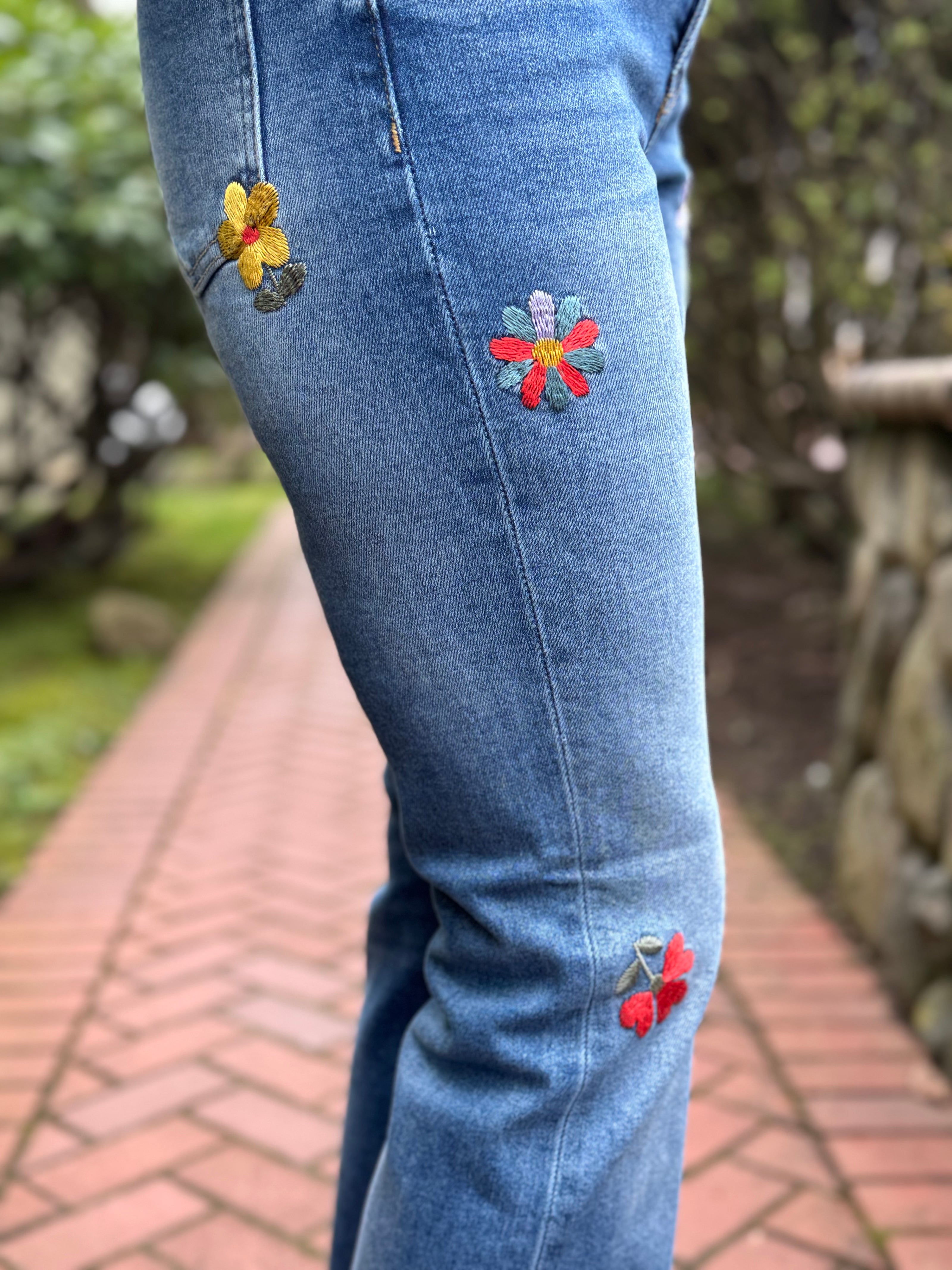 Spring Bloom Mid Rise Bootcut Jeans right leg embroidery close up