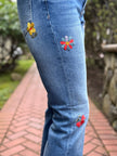 Spring Bloom Mid Rise Bootcut Jeans right leg embroidery close up