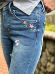 Spring Bloom Mid Rise Bootcut Jeans front left pocket embroidery close up
