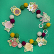 Do It Yourself Wood Garland flowers colored in