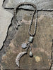 Paula Carvalho Crescent Moon full necklace on stone