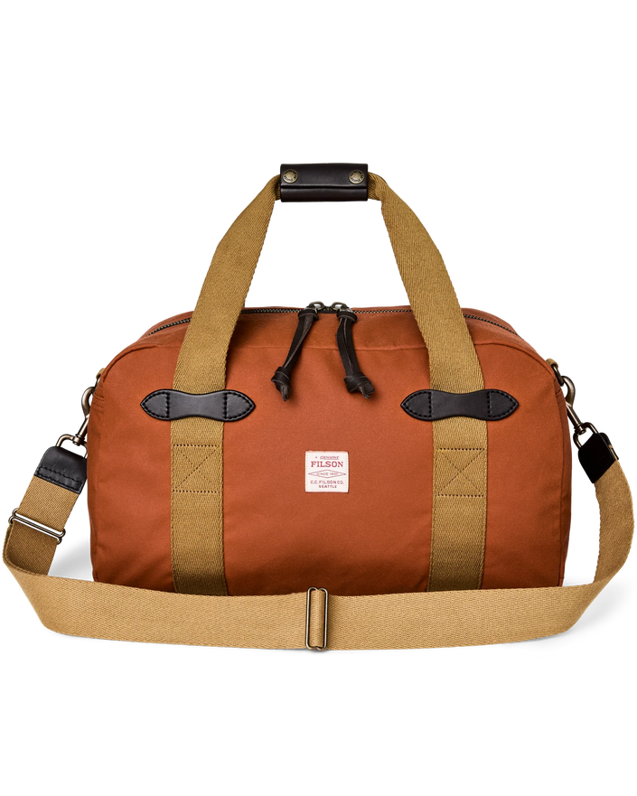 tin cloth small duffle bag rust front
