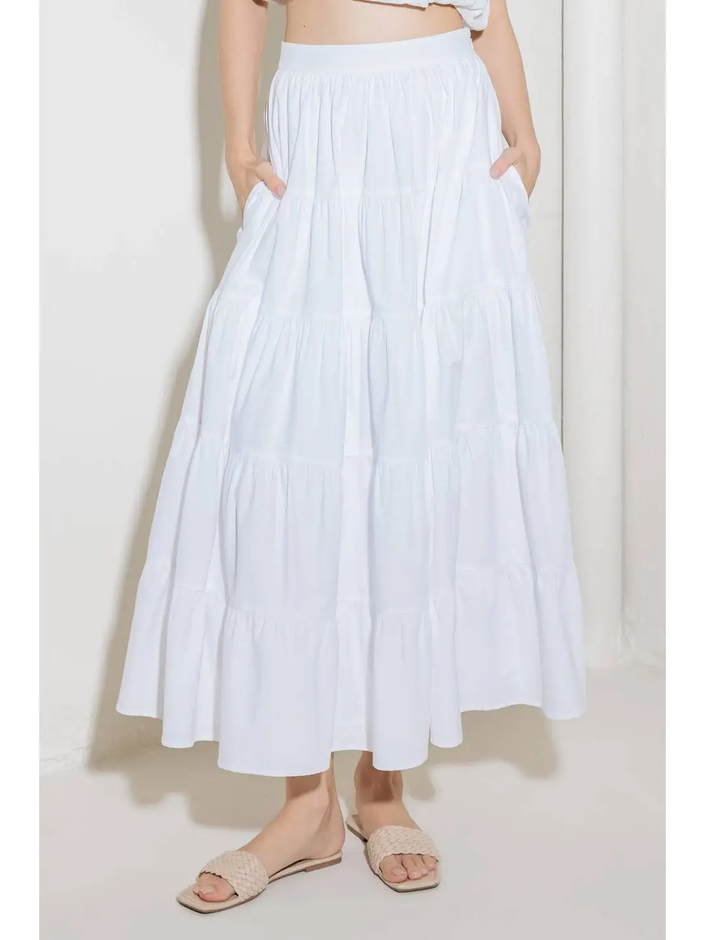 A solid woven tiered full midi skirt