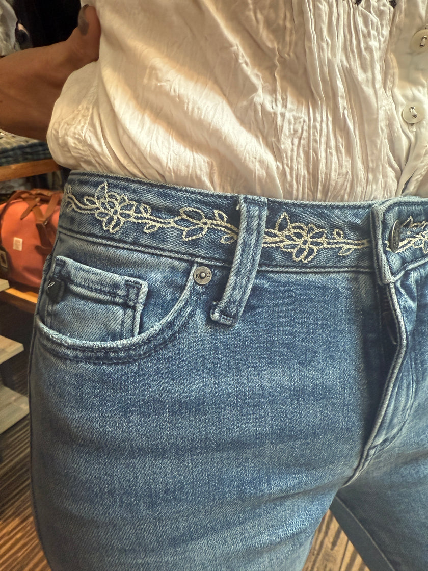 MID RISE FLARE JEANS | Dark waist line close up