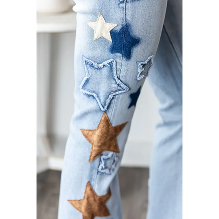 WASHED STARRY PATCH DENIM JEANS close up