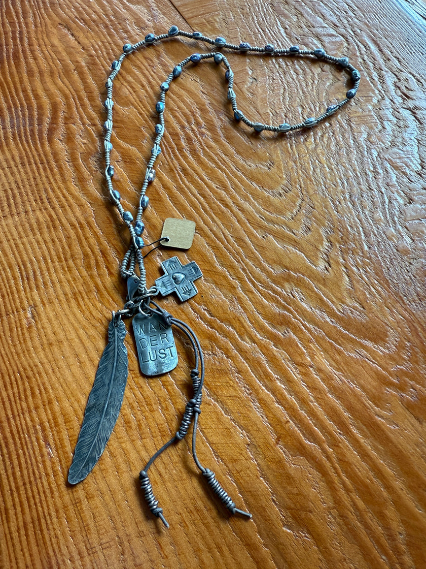 WANDERLUST Feather + Faith