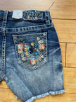 Grace denim butterfly/floral embroidered frayed hem short-back pocket detail