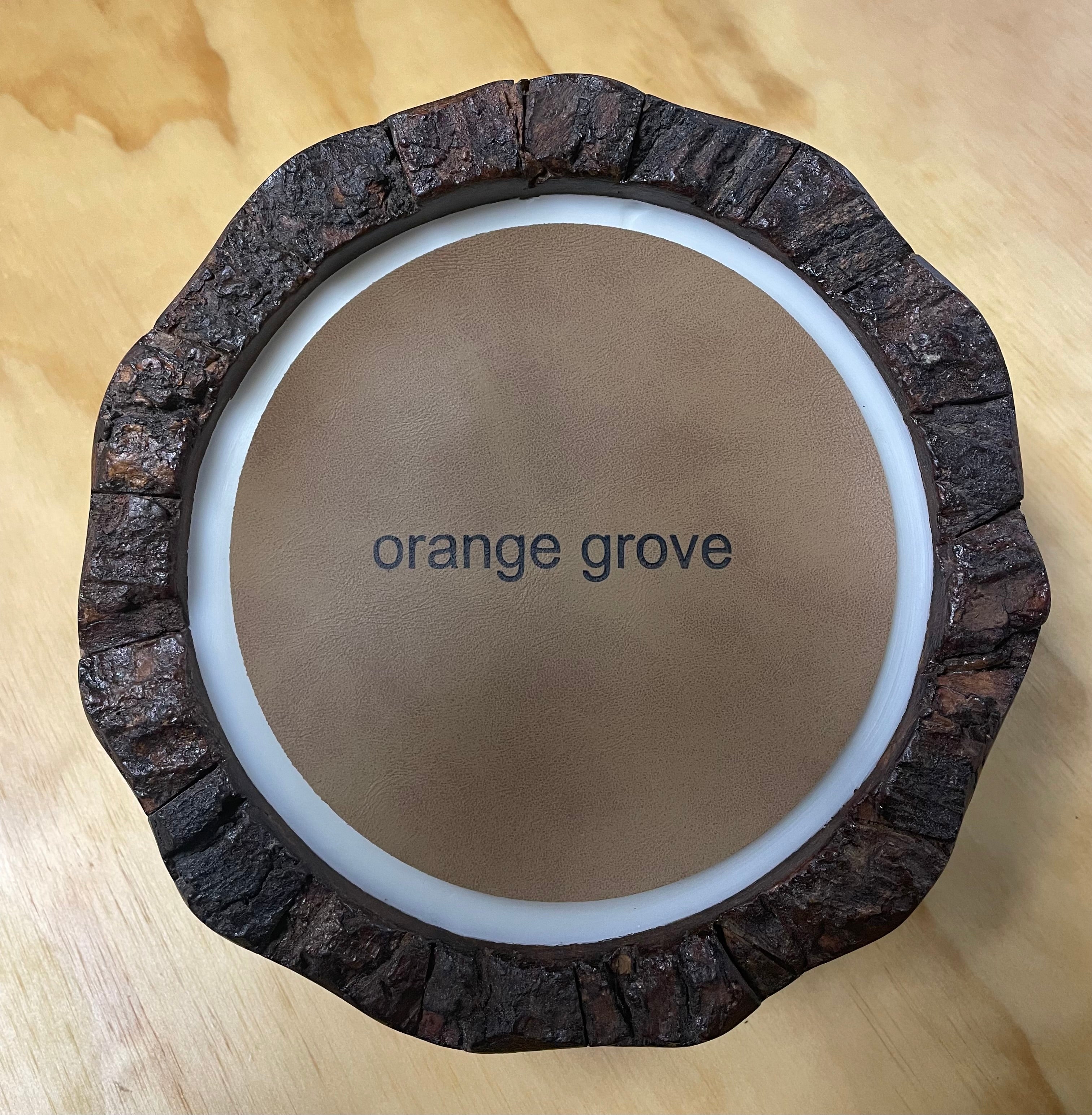 Himalayan Endurance Wood Bowl Candle 30oz | Orange Grove with leather place mat