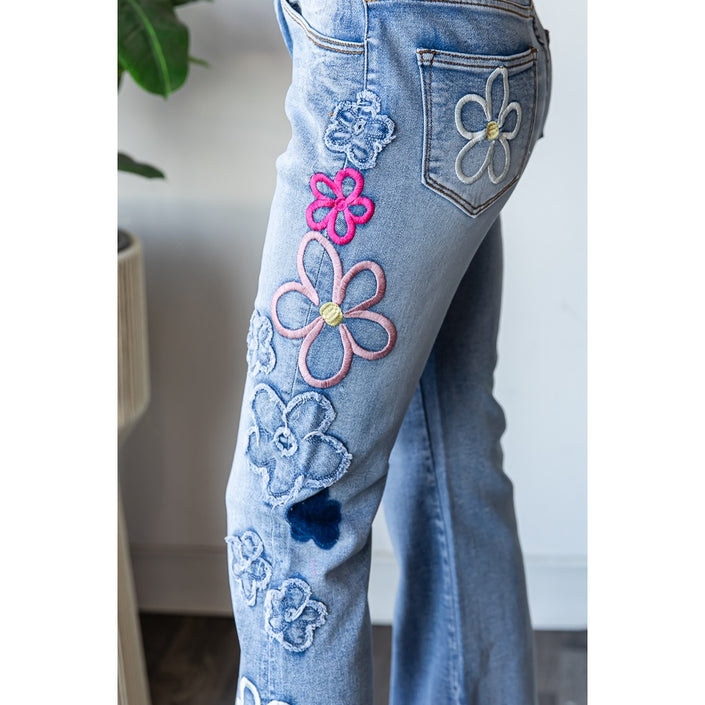 WASHED FLOWER EMBROIDERY DENIM PANTS embroidery close up