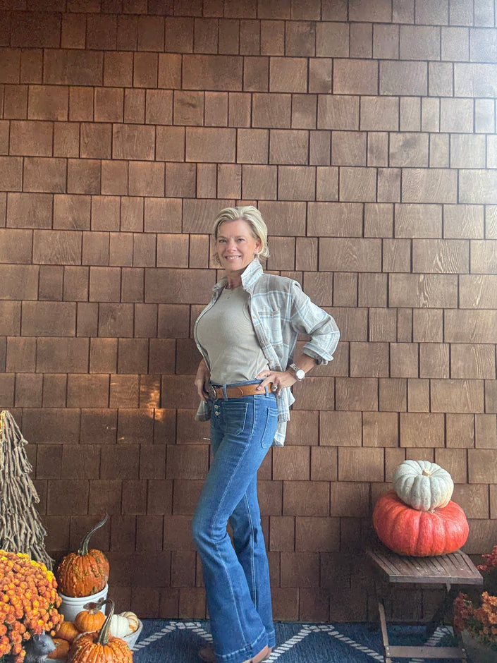 MID RISE FLARE WITH PATCH PK AND TROUSER HEM DETAILS left side