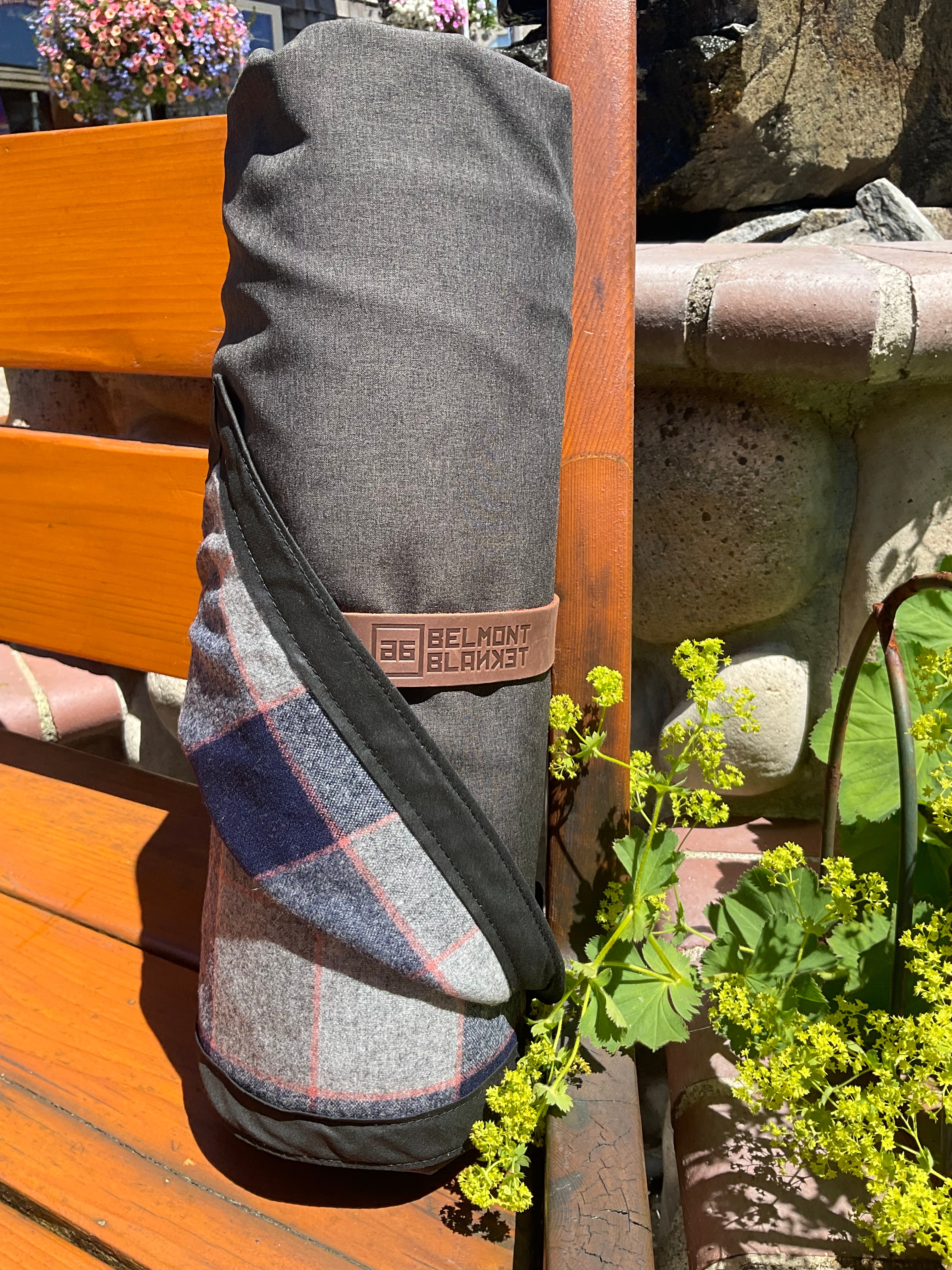 The Legacy Blanket with Pendleton Tartan | Grey, Blue and Red Rolled Up